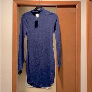 Turtle neck body-con sweater dress.